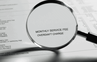 A close-up, detailed shot of a magnifying glass hovering over the 